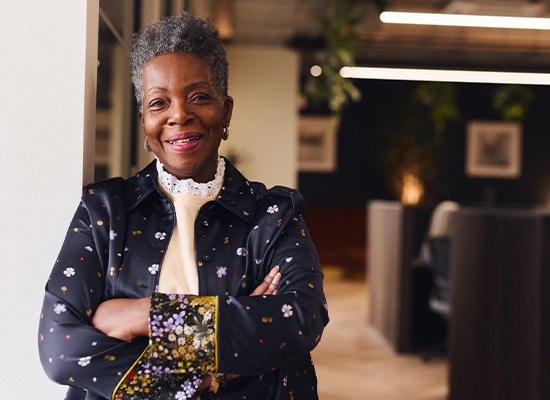 Senior woman smiling in office