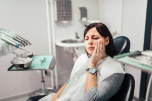 Woman at her emergency dental visit