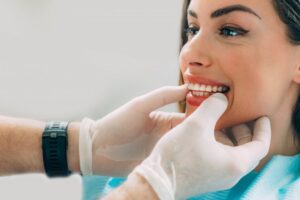 patient undergoing consultation with dentist